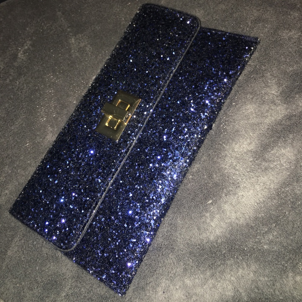 Gorgeous GUESS royal blue glitter clutch